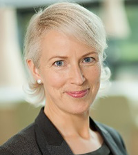 Profilbild på en kvinna i ljust hår