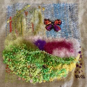 Embroidered butterfly, photo.