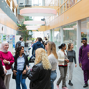 Students in a bright indoor space.