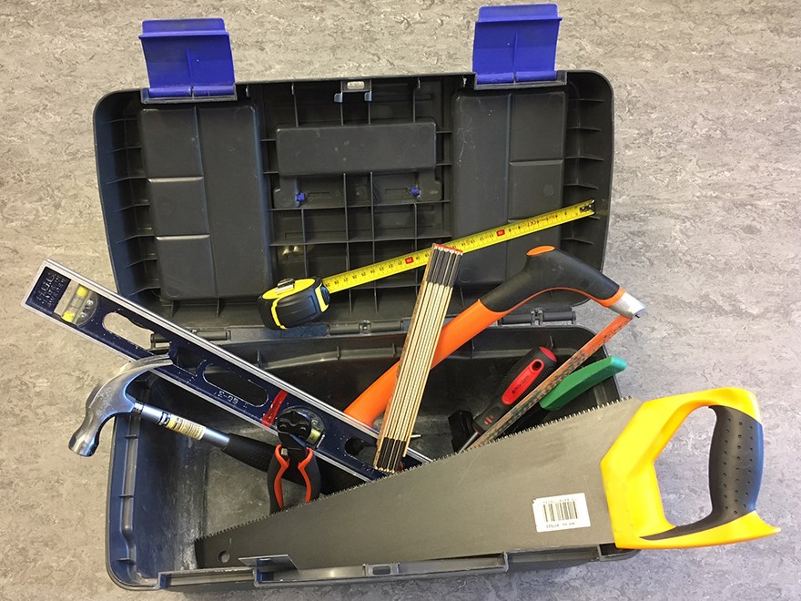 Toolbox with various tools, photo.