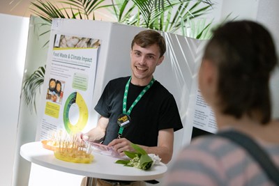 Thesis Day 2023 participant by his poster. Photo: Johan Wahlgren
