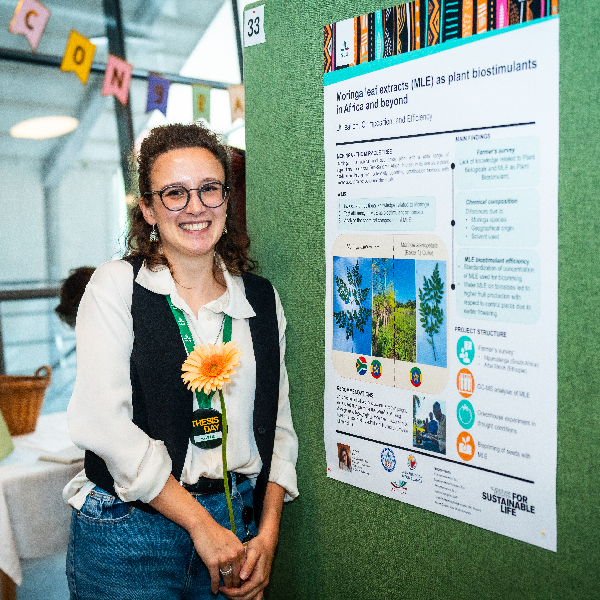 Silvia by her poster during Thesis Day 2024 in Alnarp. Photographer Joe Miller