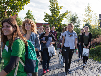 Students on a guided tour outdoors