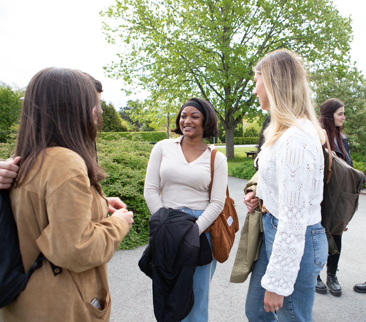 Students talking outdoors.